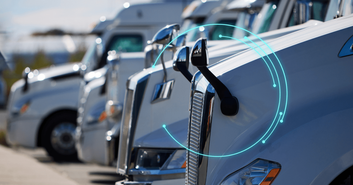 isaac-trucking-fleet-ai-technology-overlay Close-up of truck cabs with blue AI connectivity lines, symbolizing ISAAC's AI integration in trucking.